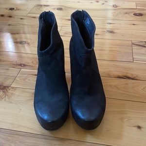 Black leather booties by Steven